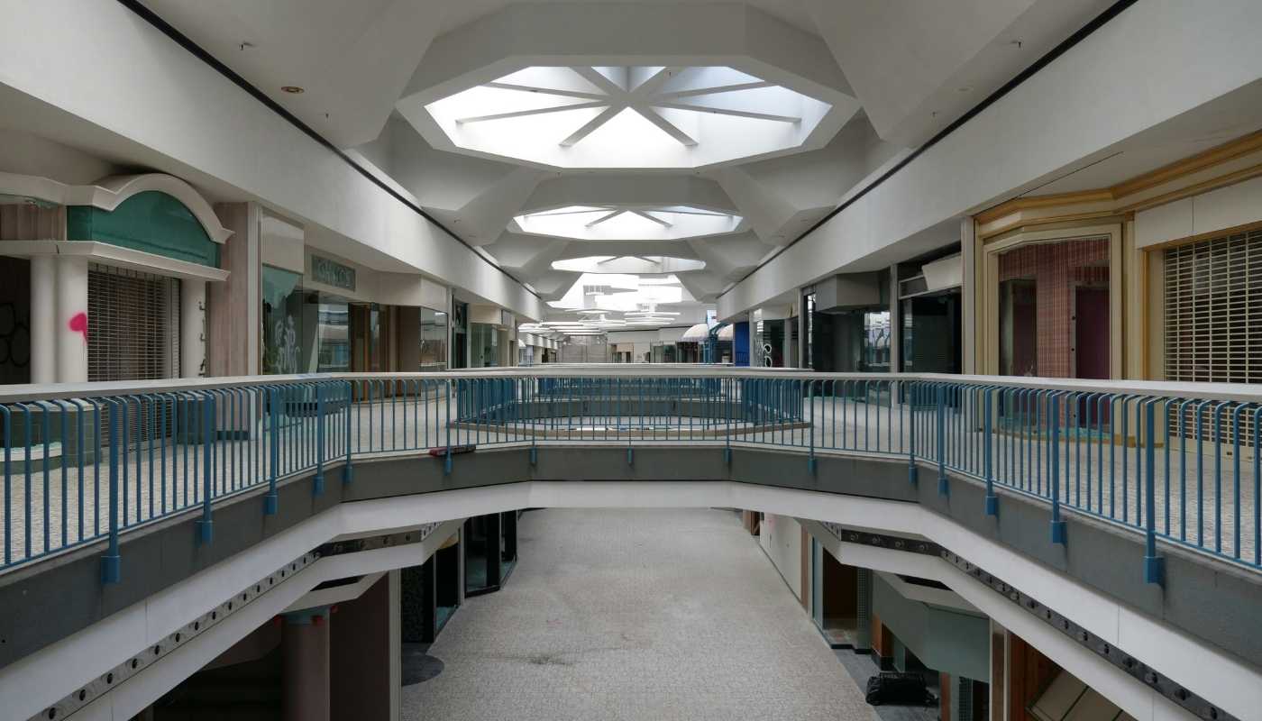 Tips for Mall Owners to Maximize Marketing Services Mall owner reviewing marketing strategies to boost mall performance